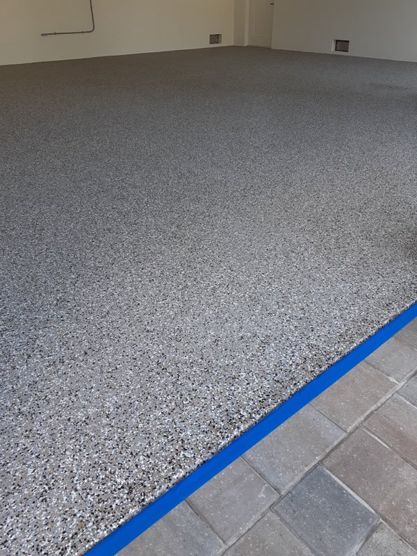 Freshly coated floor, edges still taped off