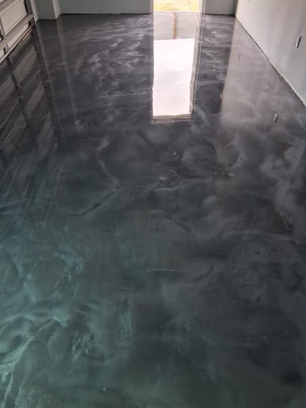 The same garage floor finished in a metallic epoxy coating